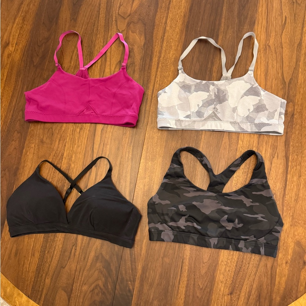 Athleta sports Bras - set of 4. Pink, Gray Camo, Black Camo & Black - size Lg